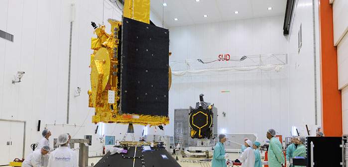 Aeroplans - Both Thales Alenia Space-built satellites for Ariane 5s next mission are shown during initial processing inside the S5B integration hall of the Spaceports S5 payload preparation facility In the foreground is RASCOM-QAF1R while Nilesat-201 is visible in the background © Arianespace ESA CNES